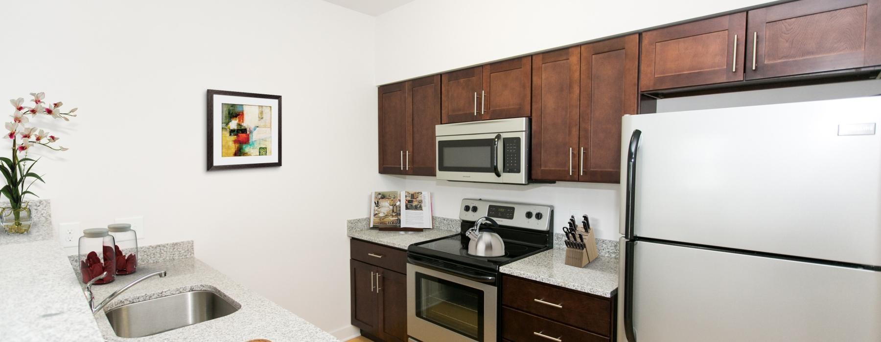 a kitchen with a stove and oven